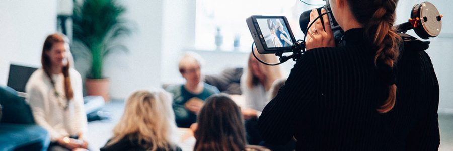 Television camera filming group.
